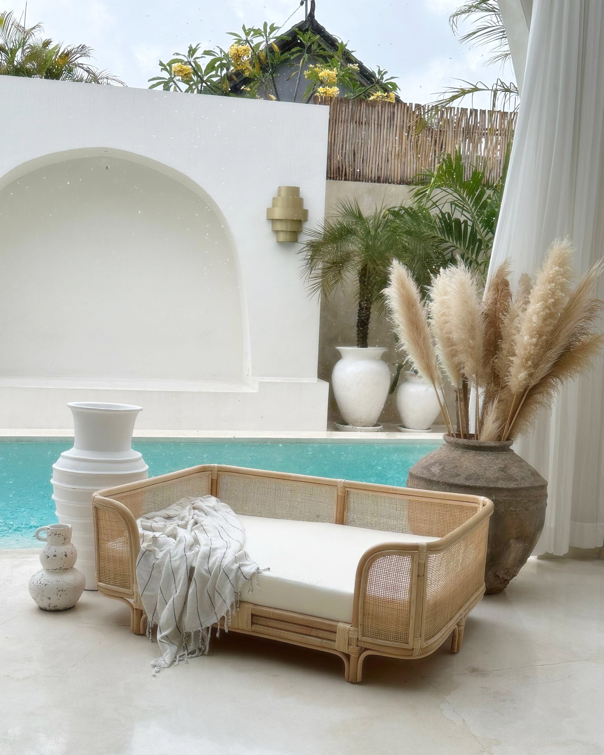 Ralf Rattan Dog Bed